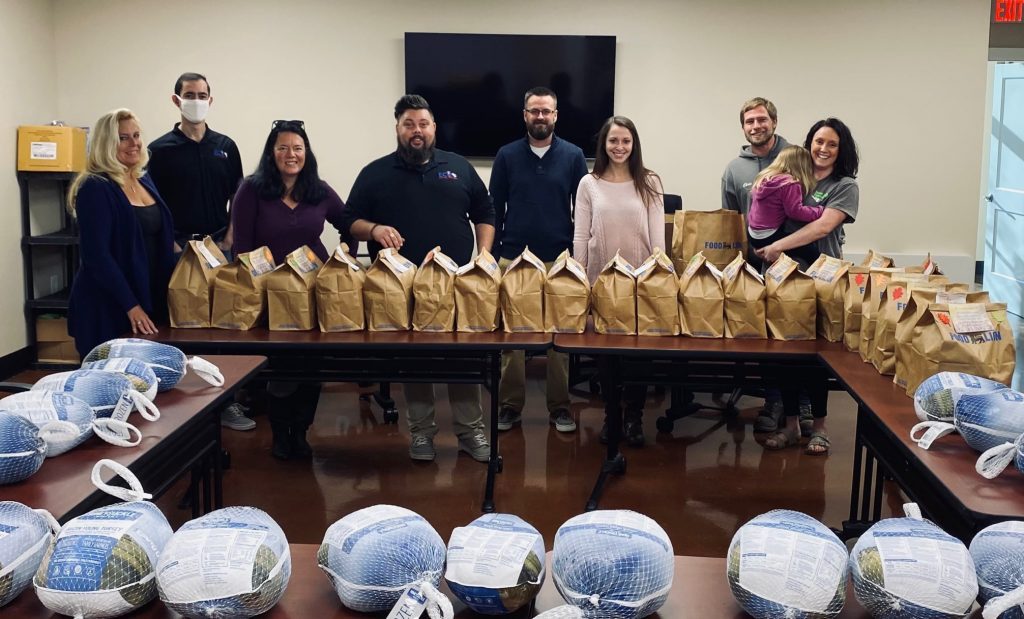 Inlet Fencing makes a generous contribution of Thanksgiving meals.